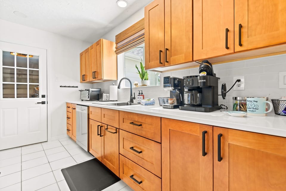 Kitchen - coffee bar, sink, toaster & toaster oven and dishwasher