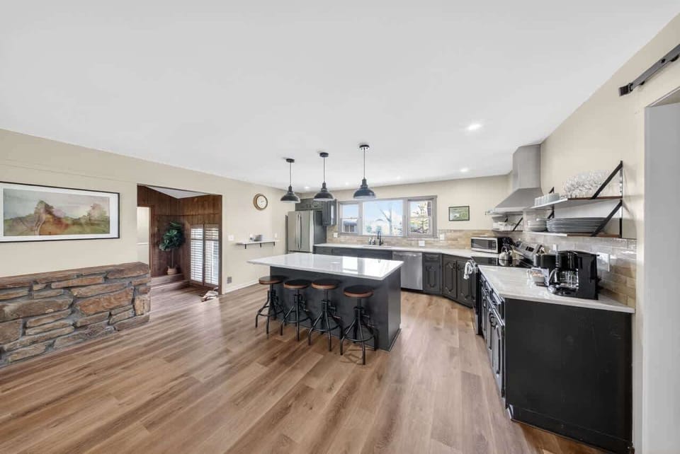 Kitchen view from the foyer — fully stocked for the home chef