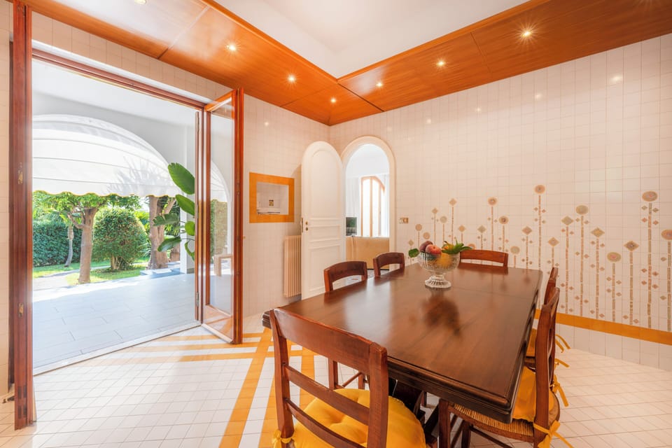 Deluxe Apartment, Patio, Garden View | Living area | 32-inch flat-screen TV with digital channels