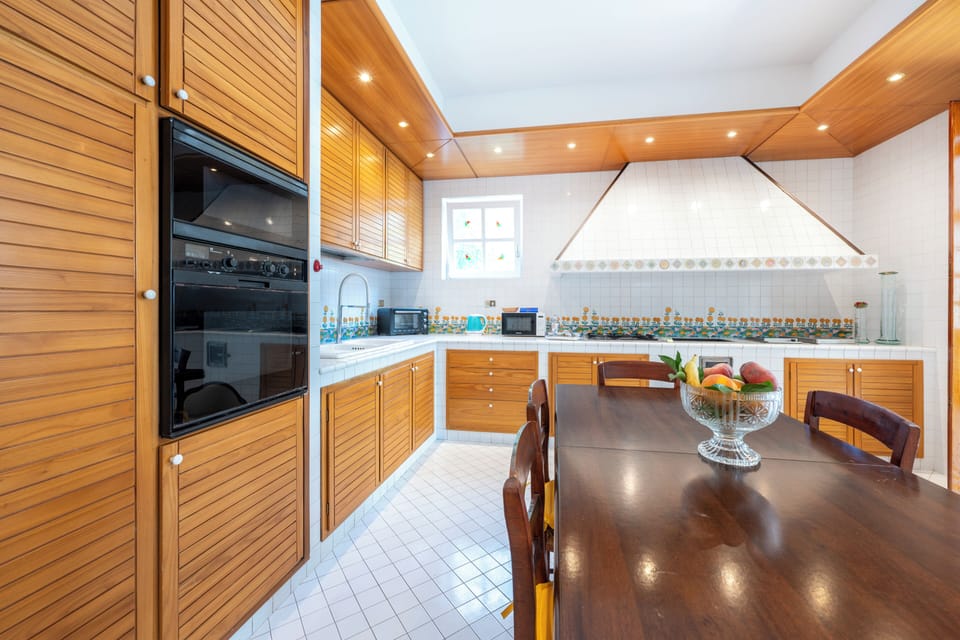 Deluxe Apartment, Patio, Garden View | Private kitchen | Full-size fridge, microwave, oven, stovetop
