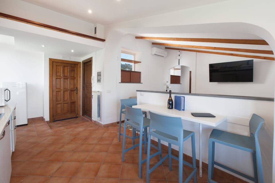 Penthouse, Partial Sea View | Living area | 32-inch flat-screen TV with digital channels