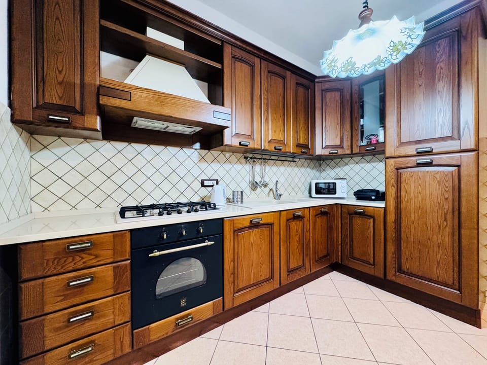 Apartment, 2 Bedrooms | Private kitchen | Full-size fridge, microwave, oven, stovetop