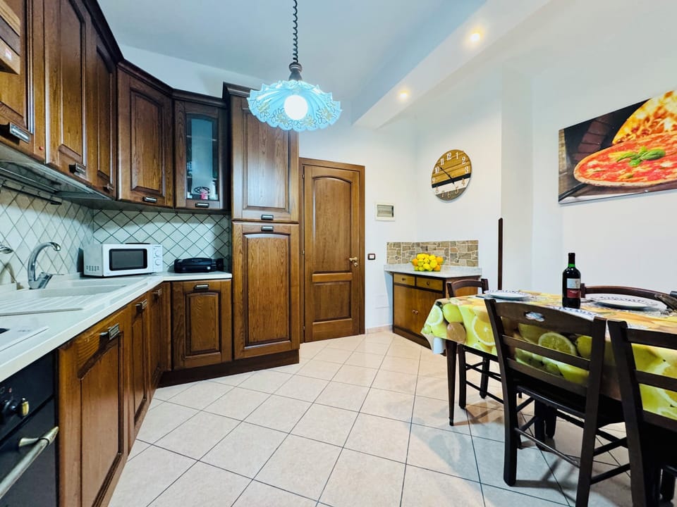Apartment, 2 Bedrooms | Private kitchen | Full-size fridge, microwave, oven, stovetop