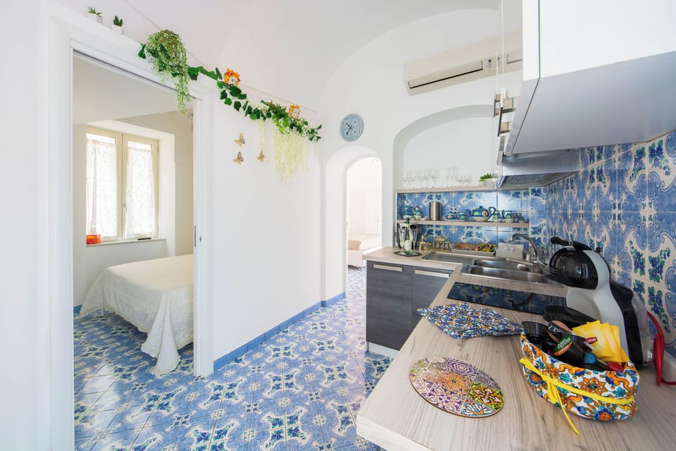 Apartment, 2 Bedrooms, Sea View | Private kitchen | Fridge, stovetop, espresso maker, electric kettle
