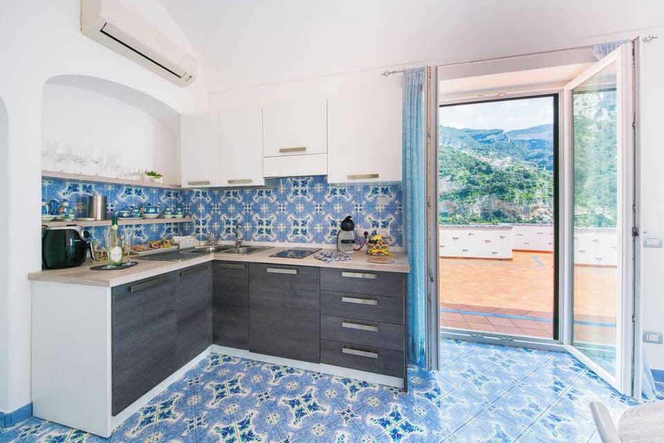 Apartment, 2 Bedrooms, Sea View | Private kitchen | Fridge, stovetop, espresso maker, electric kettle