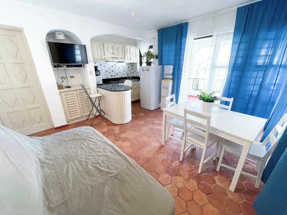 Comfort Villa, Balcony | Living area | 32-inch LCD TV with cable channels