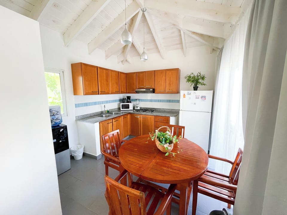 Apartment, 2 Bedrooms, Beach View | Private kitchen | Fridge, microwave, stovetop, cookware/dishes/utensils