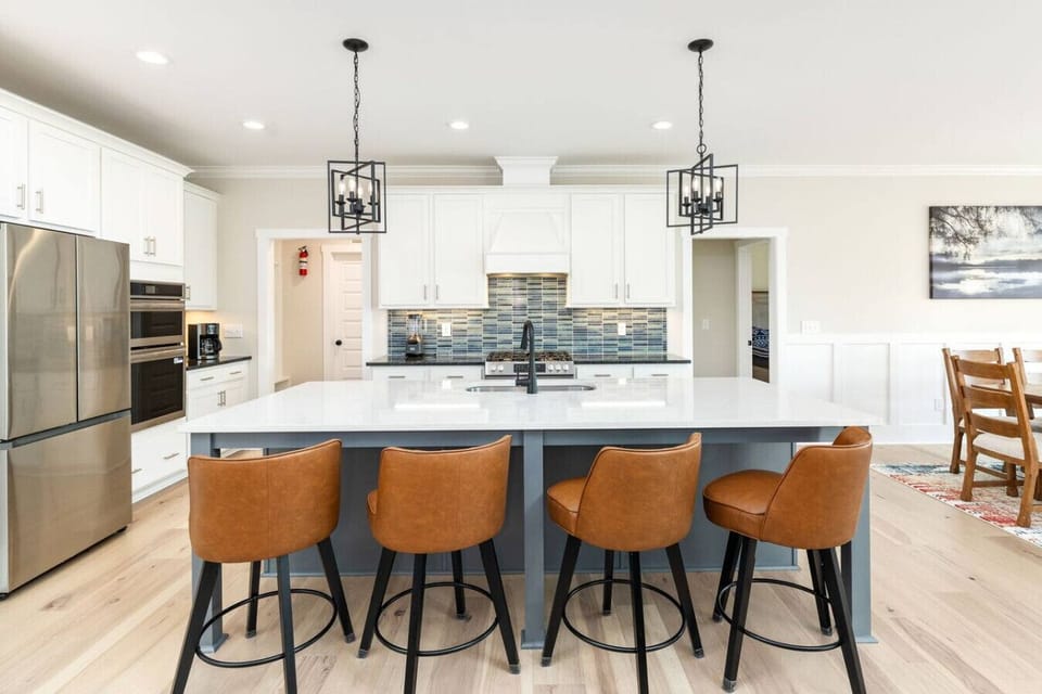 Open-concept kitchen with two ovens built for large meals