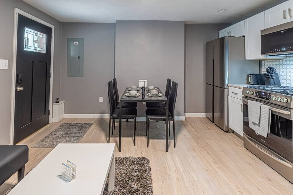 Dedicated dining area with seating for 4, perfect for meals, working, or planning your day