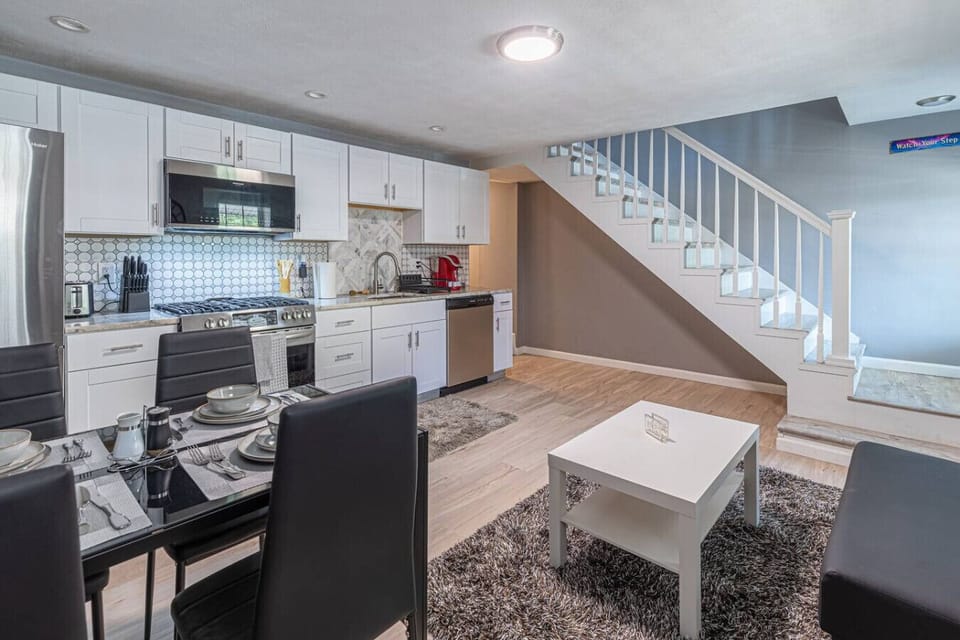 Fully equipped kitchen with cooking essentials, plus a dining area for 4 and a comfortable sofa for relaxing or socialising