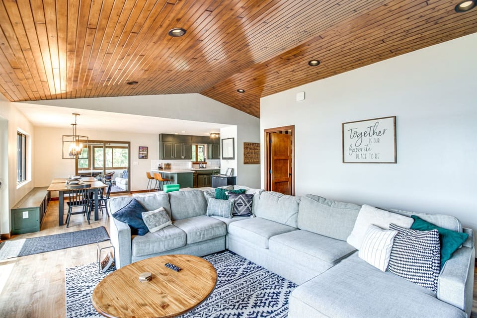 Spacious open-concept living area connecting kitchen and dining spaces