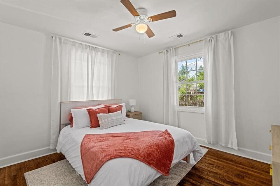 Queen bed, dressser, and closet.