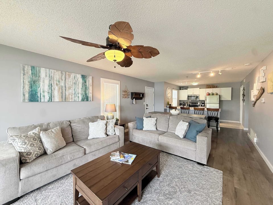 Smart TV, cozy sofa, and waterfront vibes