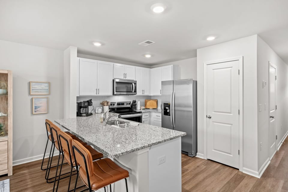 A thoughtfully designed kitchen combining style and function for an effortless stay!