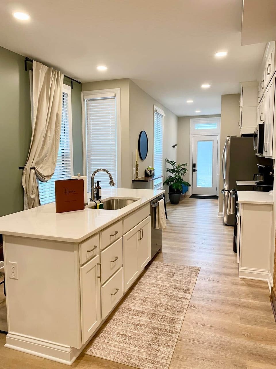 Kitchen / Stairs up / rear entrance