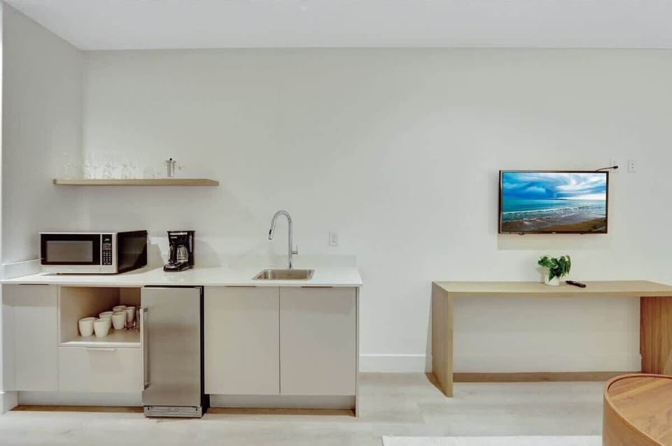 Stocked kitchenette.