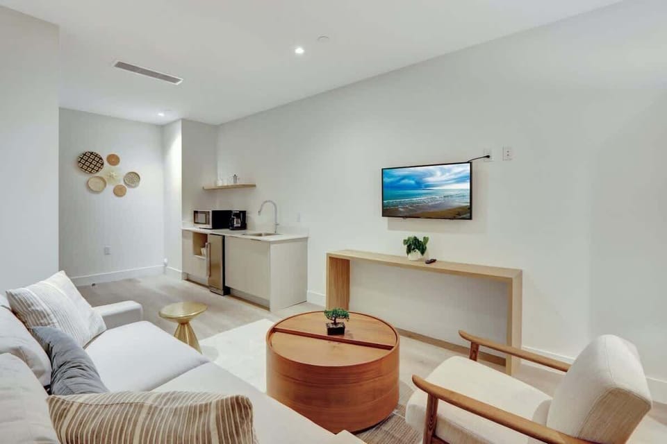 Living area with a Queen-sized sleep sofa.
