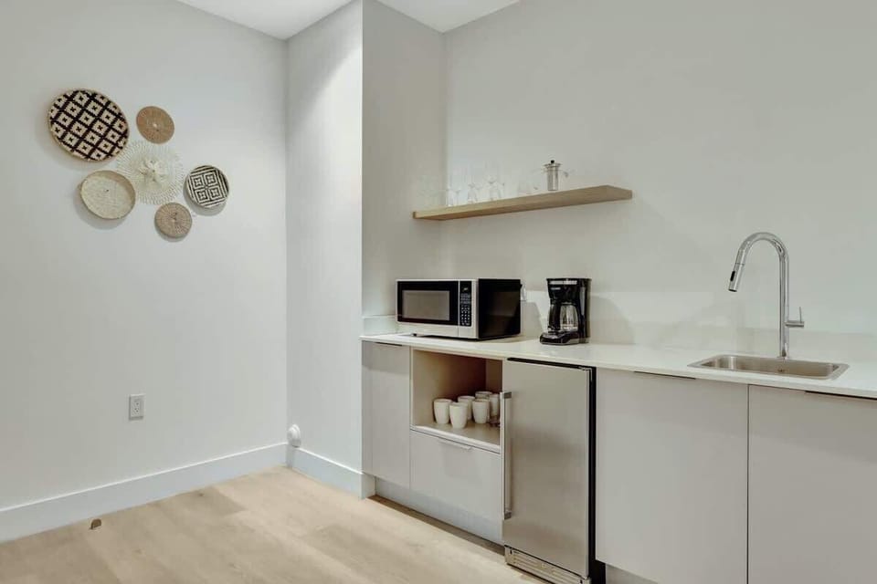 Stocked kitchenette.