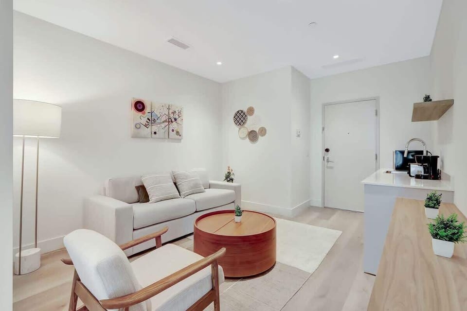 Living area with a Queen-sized sleep sofa.