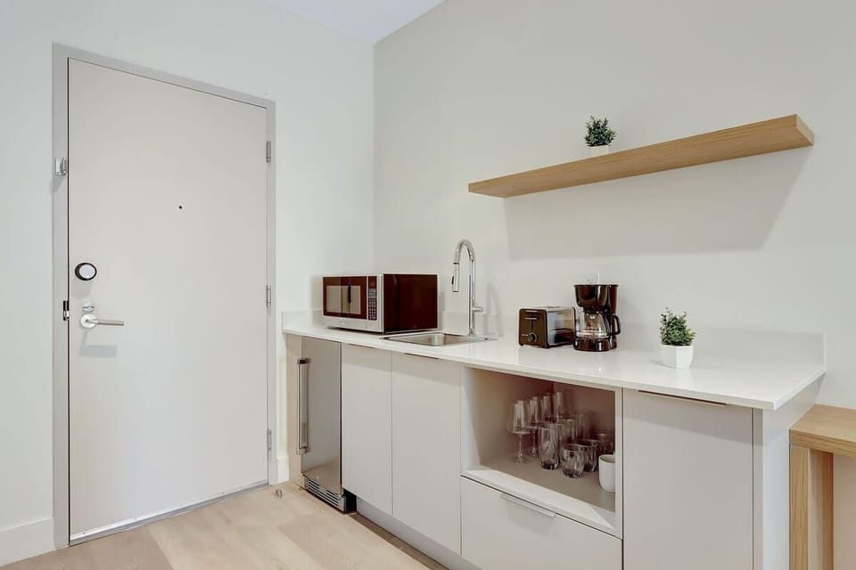 Stocked kitchenette.
