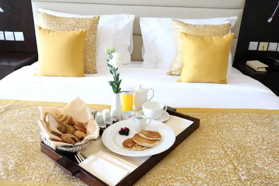 Drift off in a serene room with gentle lighting and views.