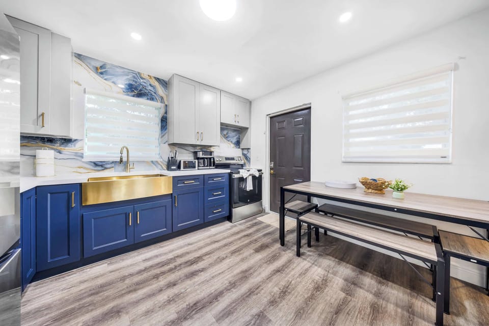 Enjoy a beautifully renovated kitchen designed for both comfort and convenience. Featuring modern appliances, stylish cabinetry, spacious countertops, and all the essentials for cooking and dining, it's the perfect space to prepare family meals.