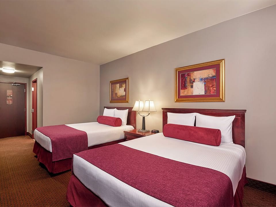 Unwind in a spacious double room with warm lighting.