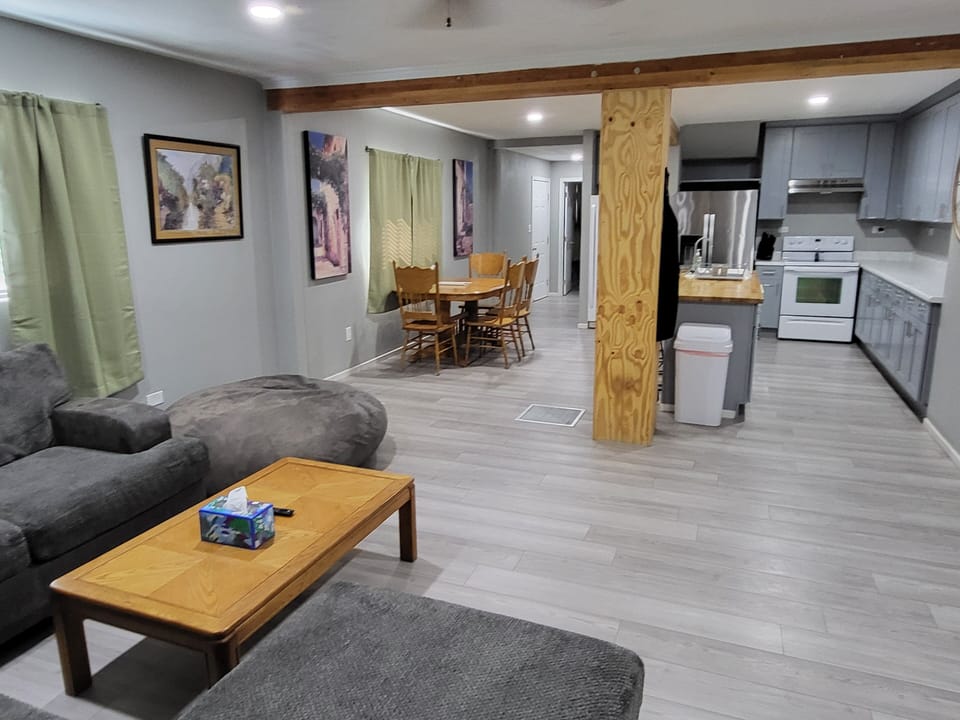 Open concept of living room dining room and kitchen