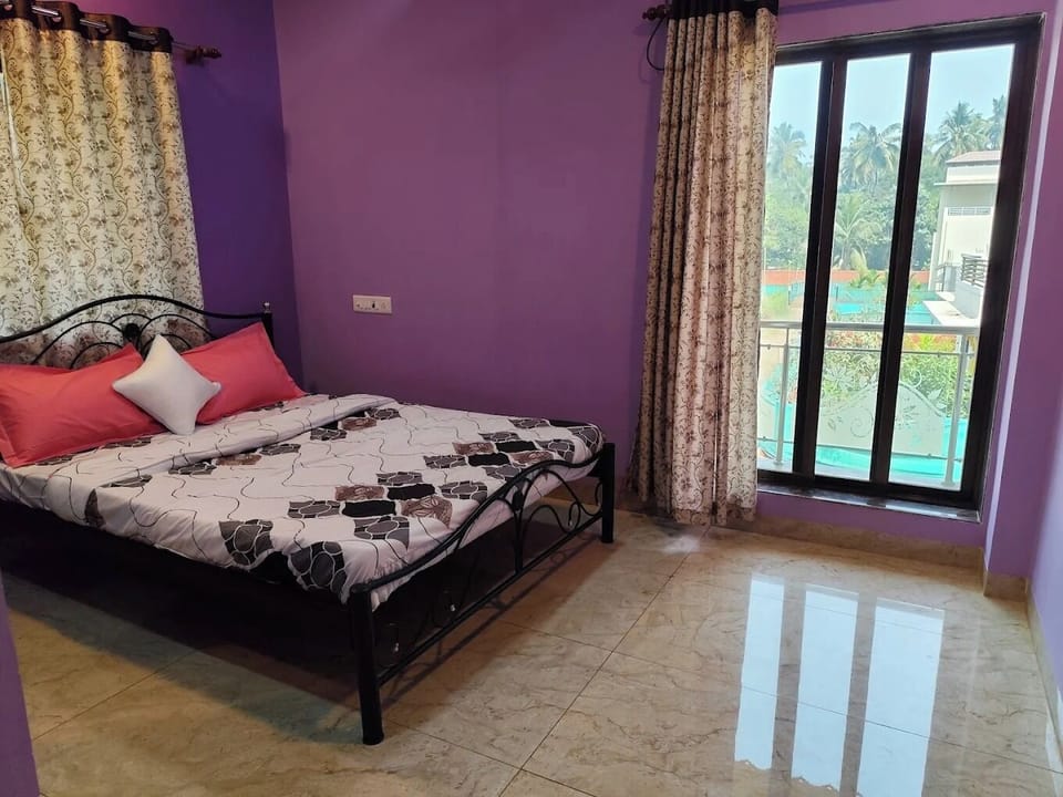 Deluxe Double Room, Pool View | Desk, laptop workspace, free WiFi