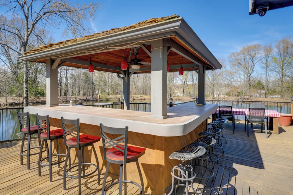 Spitfire Acres Exterior | 5,000 Sq Ft Deck | On-Site Pond