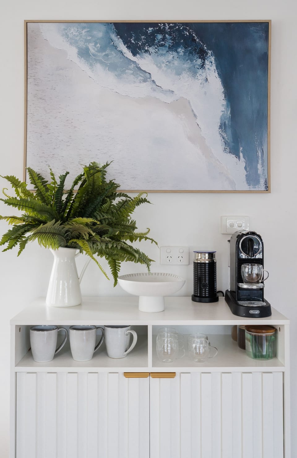 Coffee bar with Nespresso pod machine and milk frothier