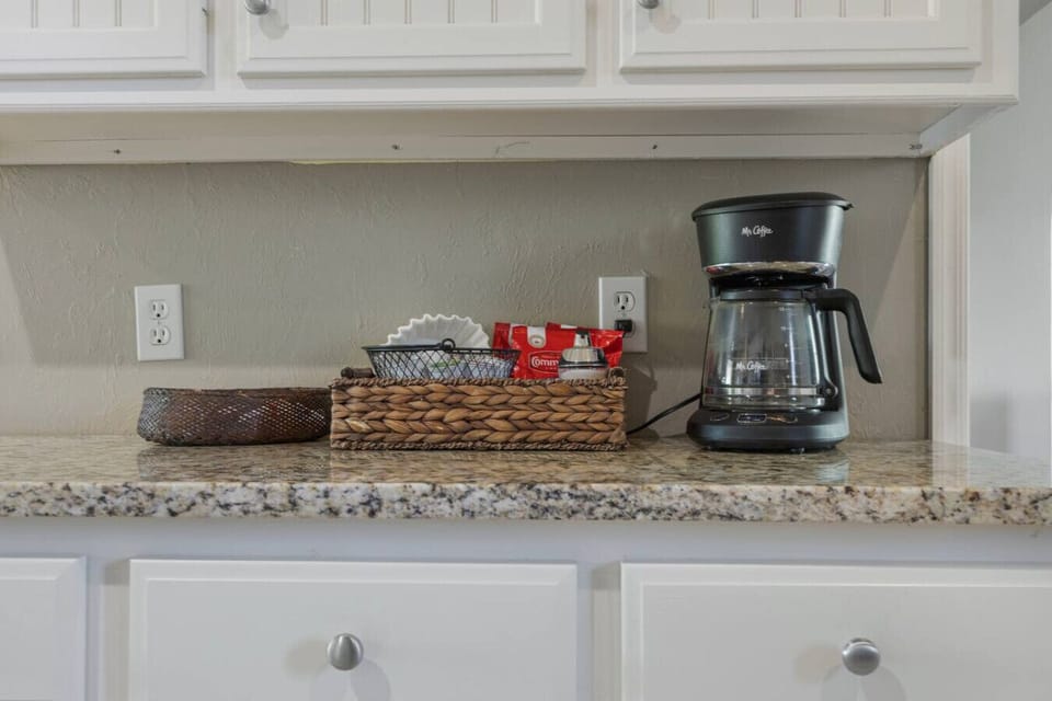Coffee station in the fully stocked kitchen