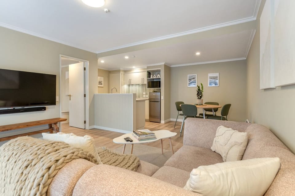 Open-plan living - lounge, dining, and kitchen all in one well-connected space