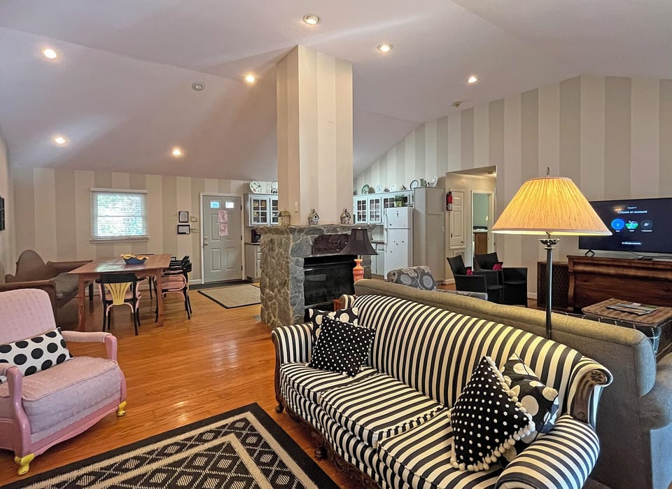 Great Room - Double sided stone gas burning fireplace