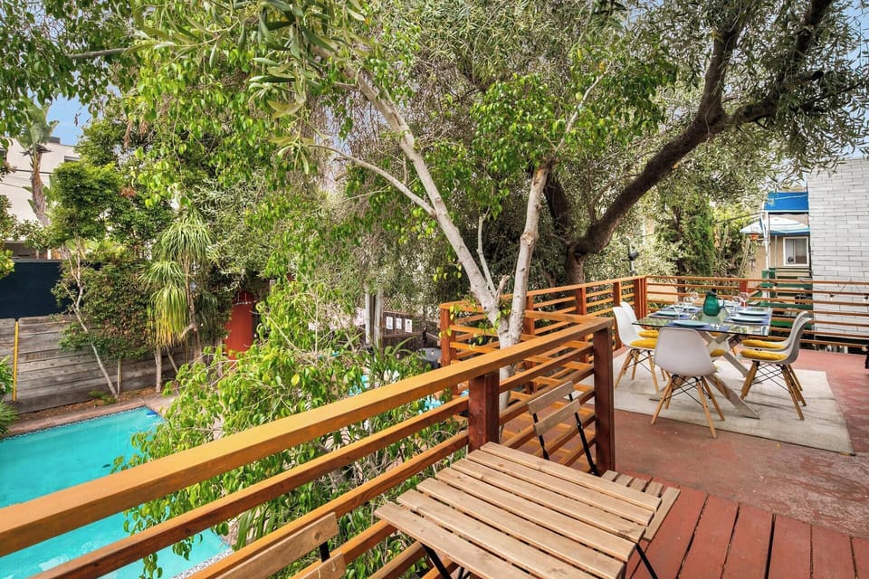 A perfect perch for sunsets, wine, and meaningful moments above the backyard retreat.