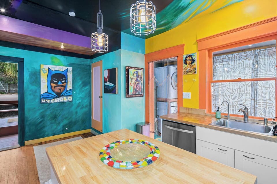 Art-filled walls meet practical design in the heart of the home.