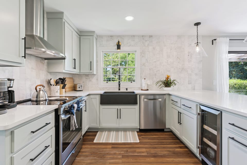 Your fully equipped kitchen awaits with gleaming appliances, spacious counters, and everything needed for memorable meals together.