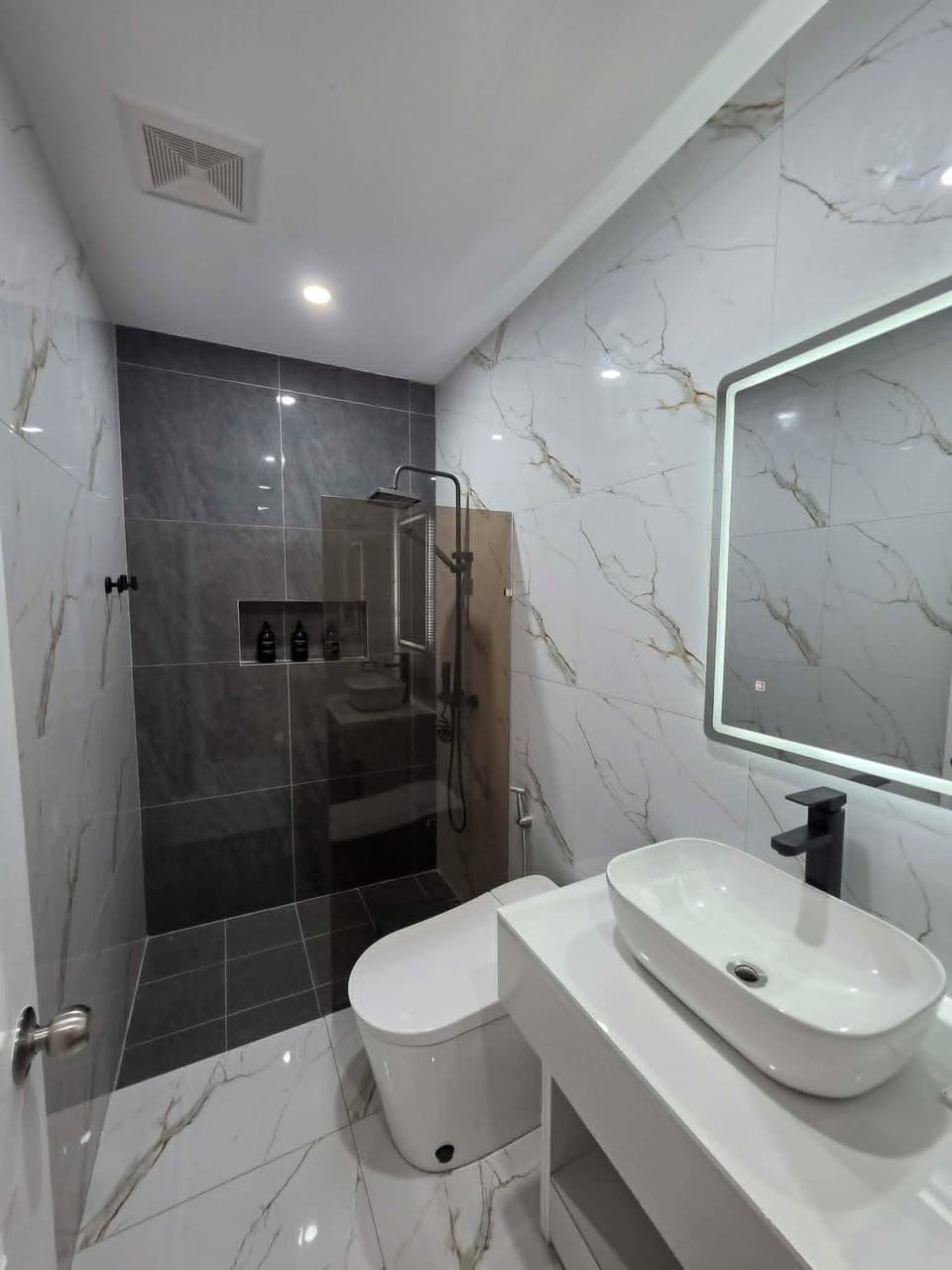 Shower, hair dryer, soap, shampoo