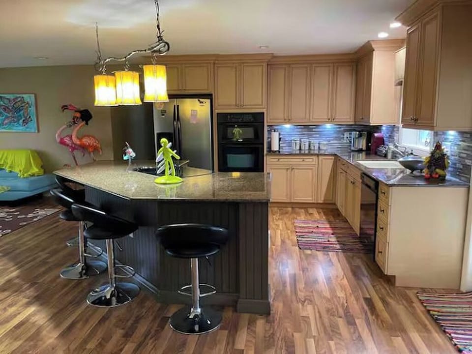 Super spacious and fully stocked kitchen.