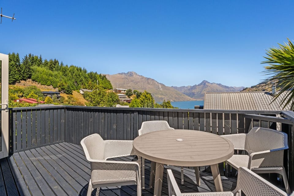 Balcony with lake and mountain views