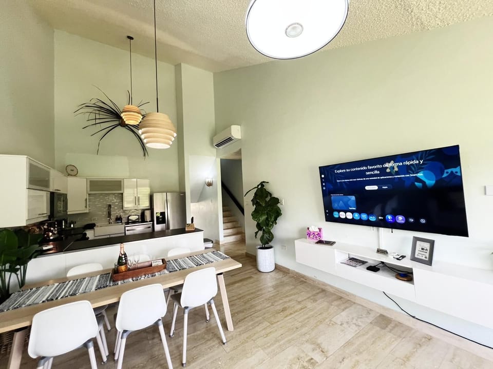 Enjoy eating at a large table while watching your favorite TV shows