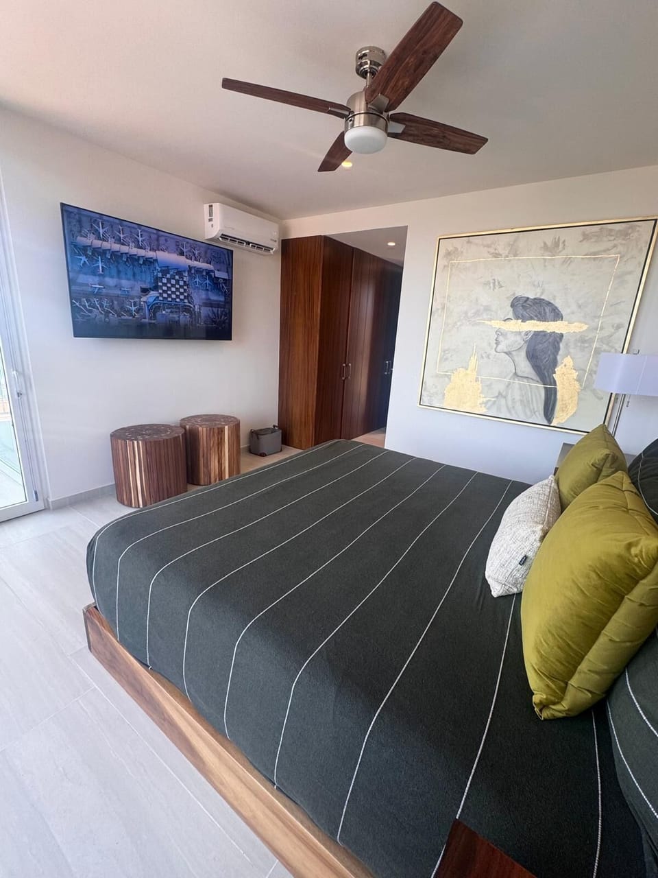 Guest Bedroom 1 is a relaxing retreat with beautiful views and a comfortable layout for rest and privacy. Enjoy downtime with a 65-inch TV featuring all major streaming services—perfect for movies and shows after a day out.