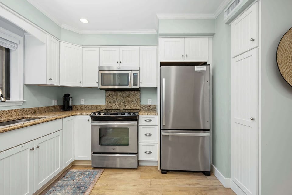 Kitchen equipped for easy meals and snacks.