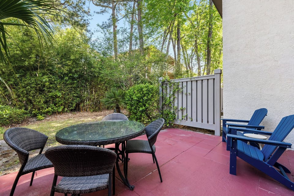 Seating area on the back porch for fresh air and downtime.
