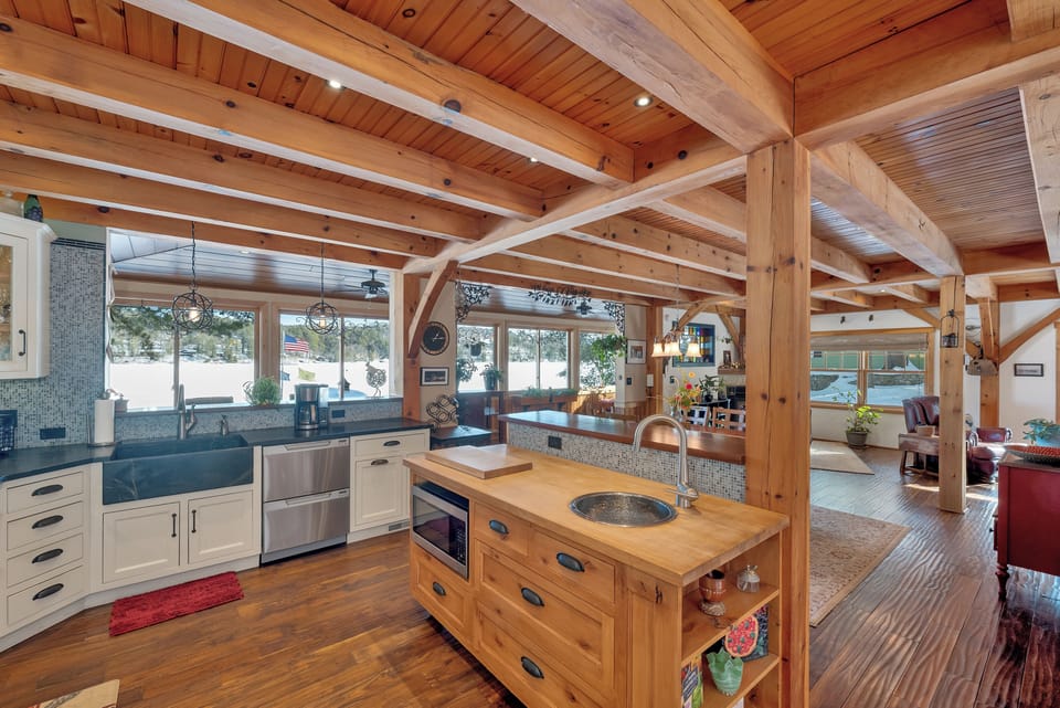 The lovely kitchen lake winnipesaukee views and plenty of bar height seating
