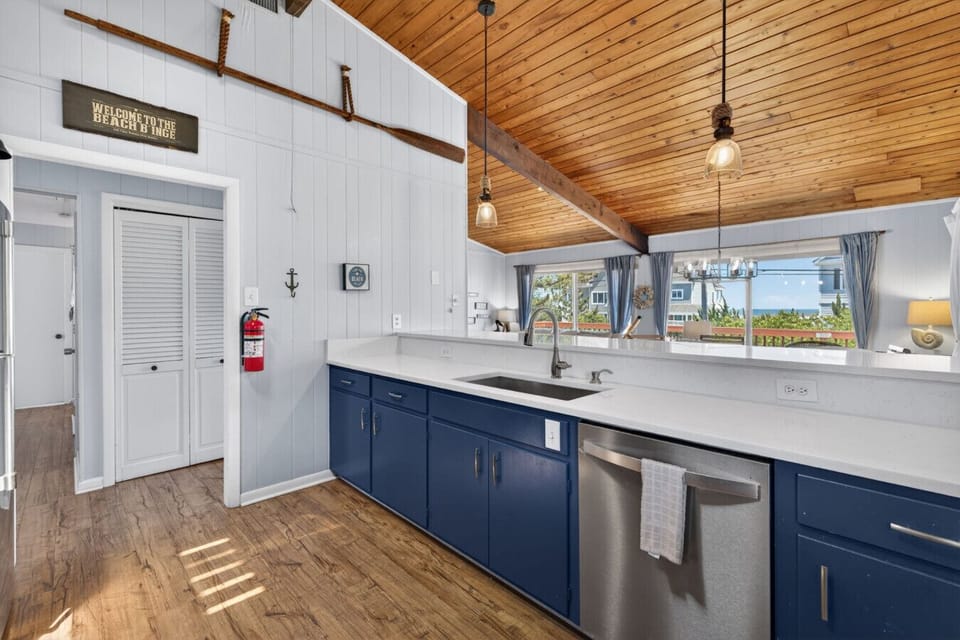 Cook with a view and stay part of every conversation in this open-concept kitchen overlooking the heart of the home.
