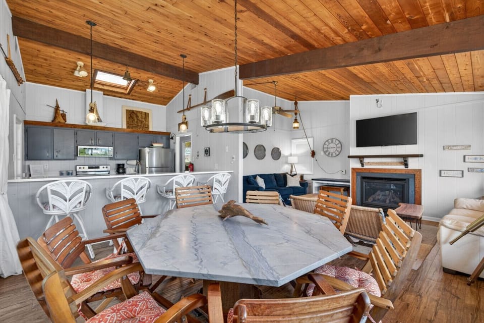 Gather, dine, and unwind in this warm coastal-inspired great room designed for unforgettable family vacations.
