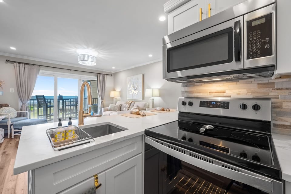 Cook with a view—oceanfront living just steps beyond the balcony