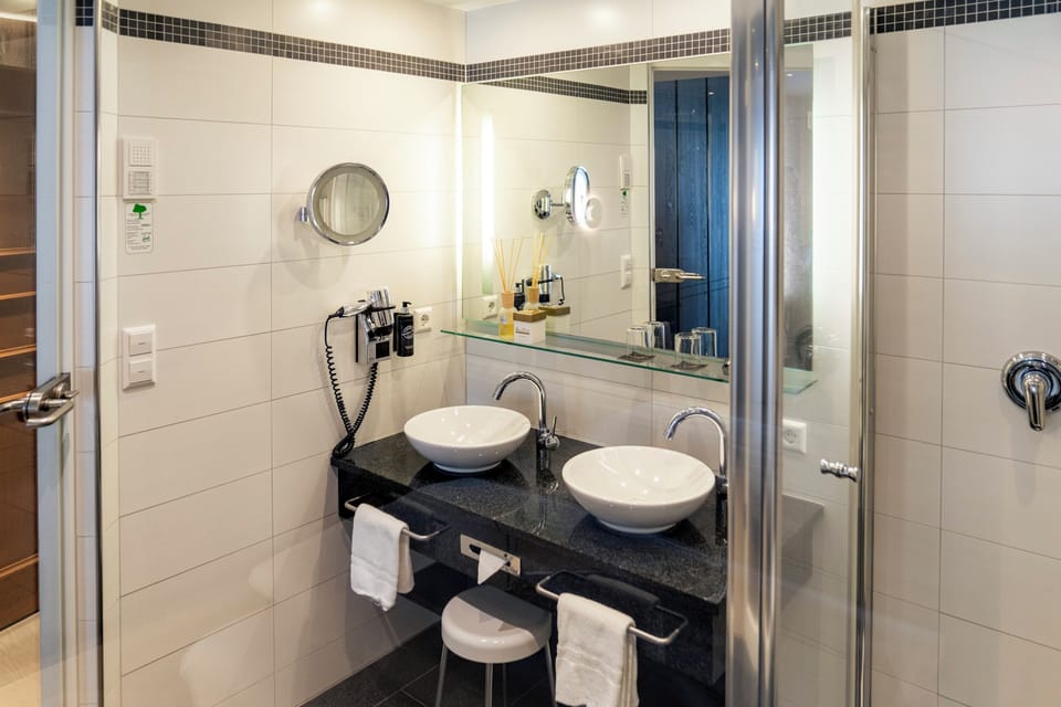 Hair dryer, towels, soap, shampoo