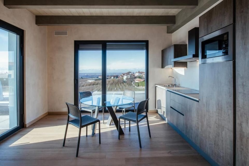 Deluxe Apartment, Balcony, Pool View | Private kitchen | Fridge, microwave, stovetop, dishwasher